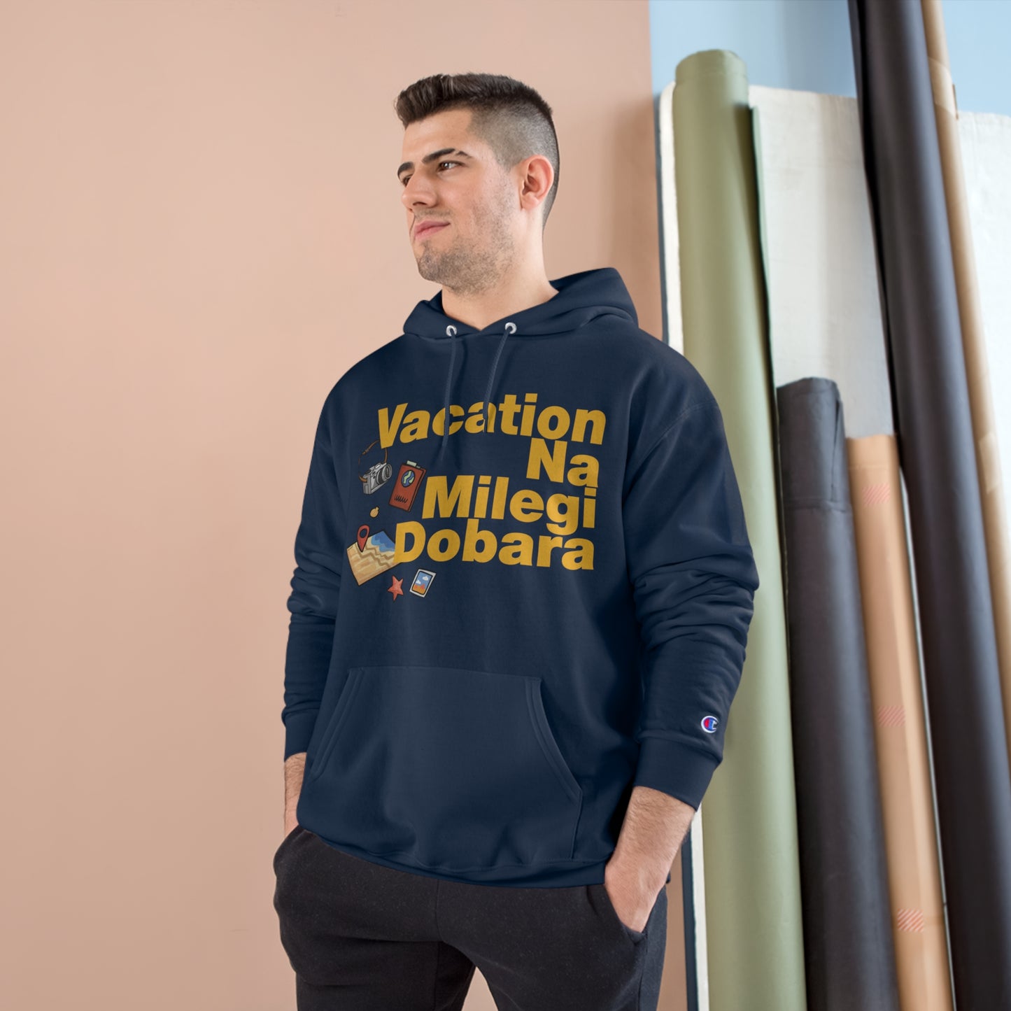 Man wearing VNMD Champion hoodie featuring "Vacation Na Milegi Dobara" design, perfect for travel adventures.
