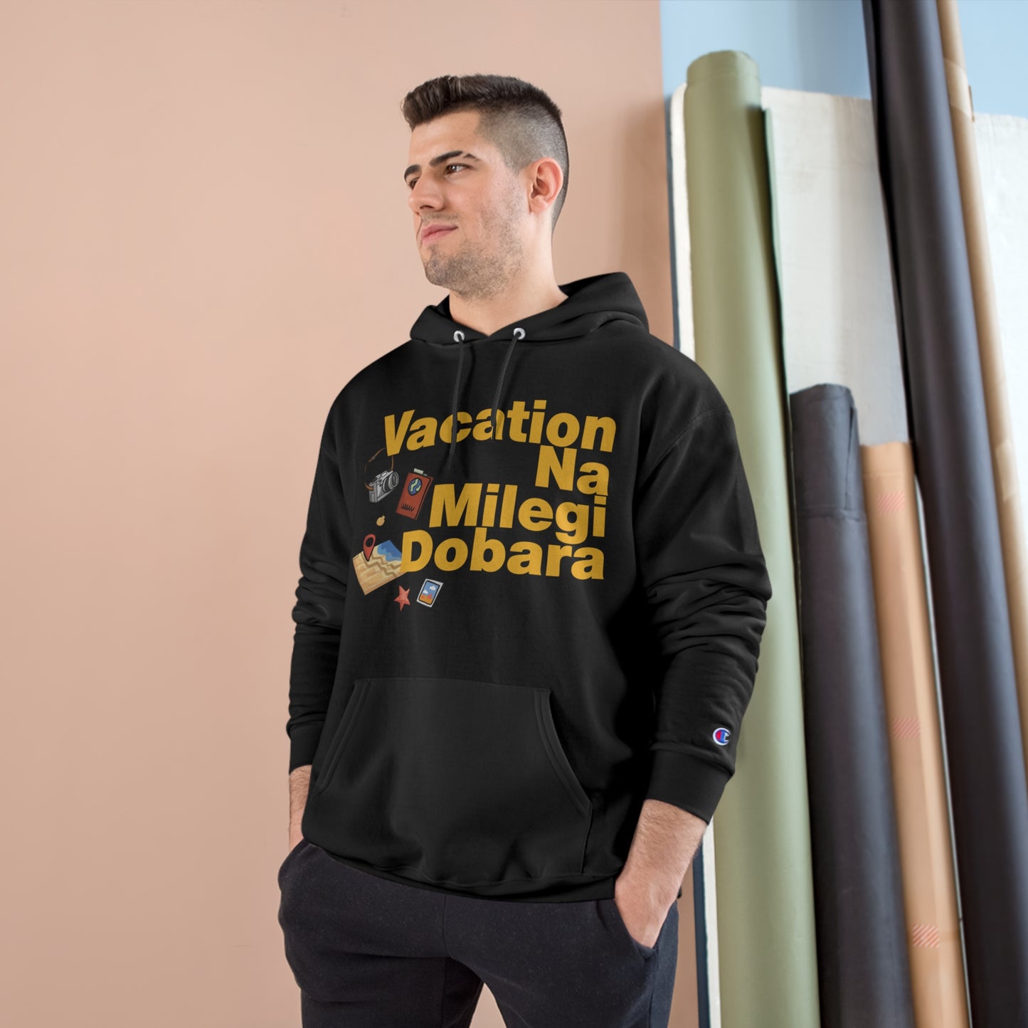 Man wearing VNMD Champion hoodie featuring "Vacation Na Milegi Dobara" design, perfect for travel and adventures.