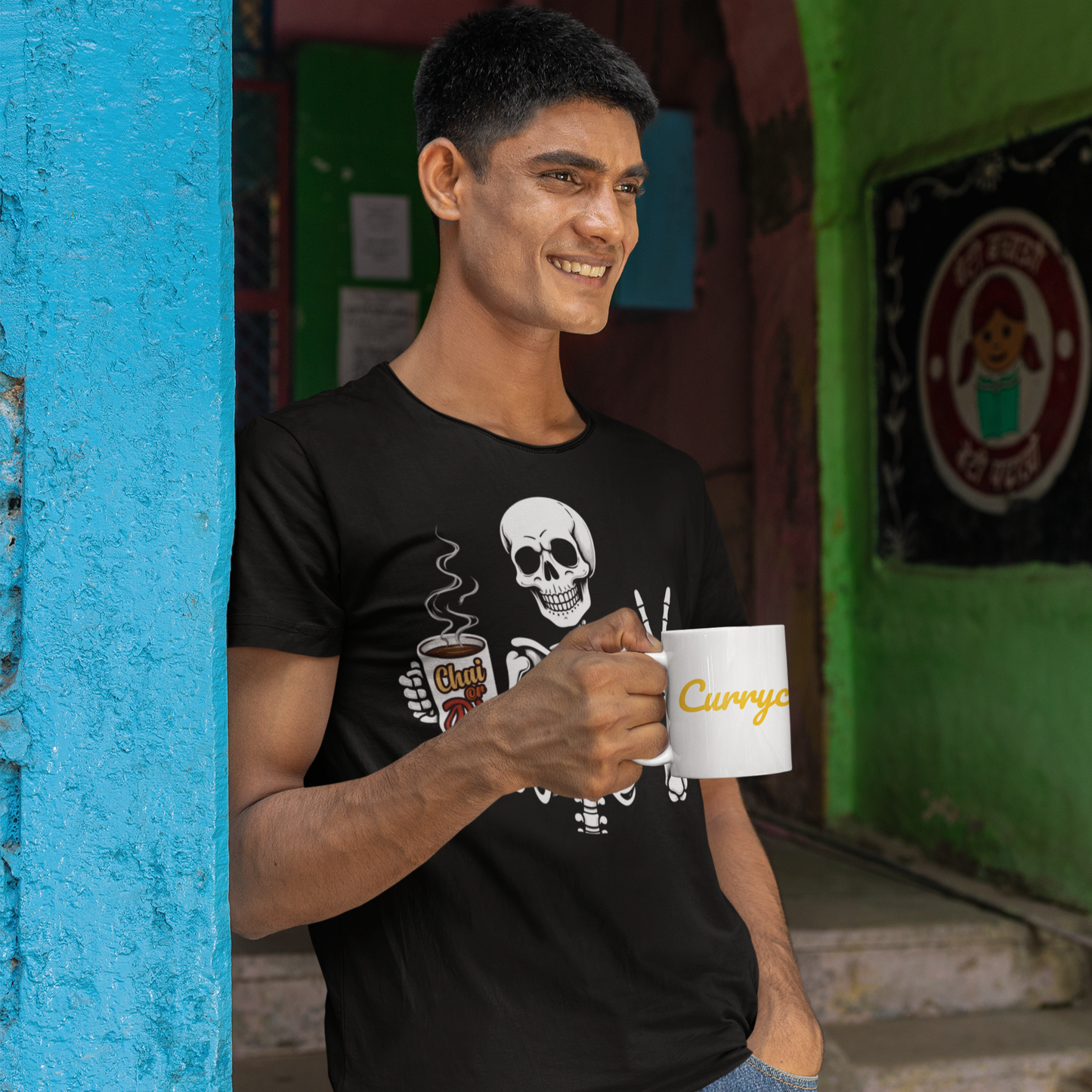Young boy wearing Currycature's chai or die tshirt in black colour.