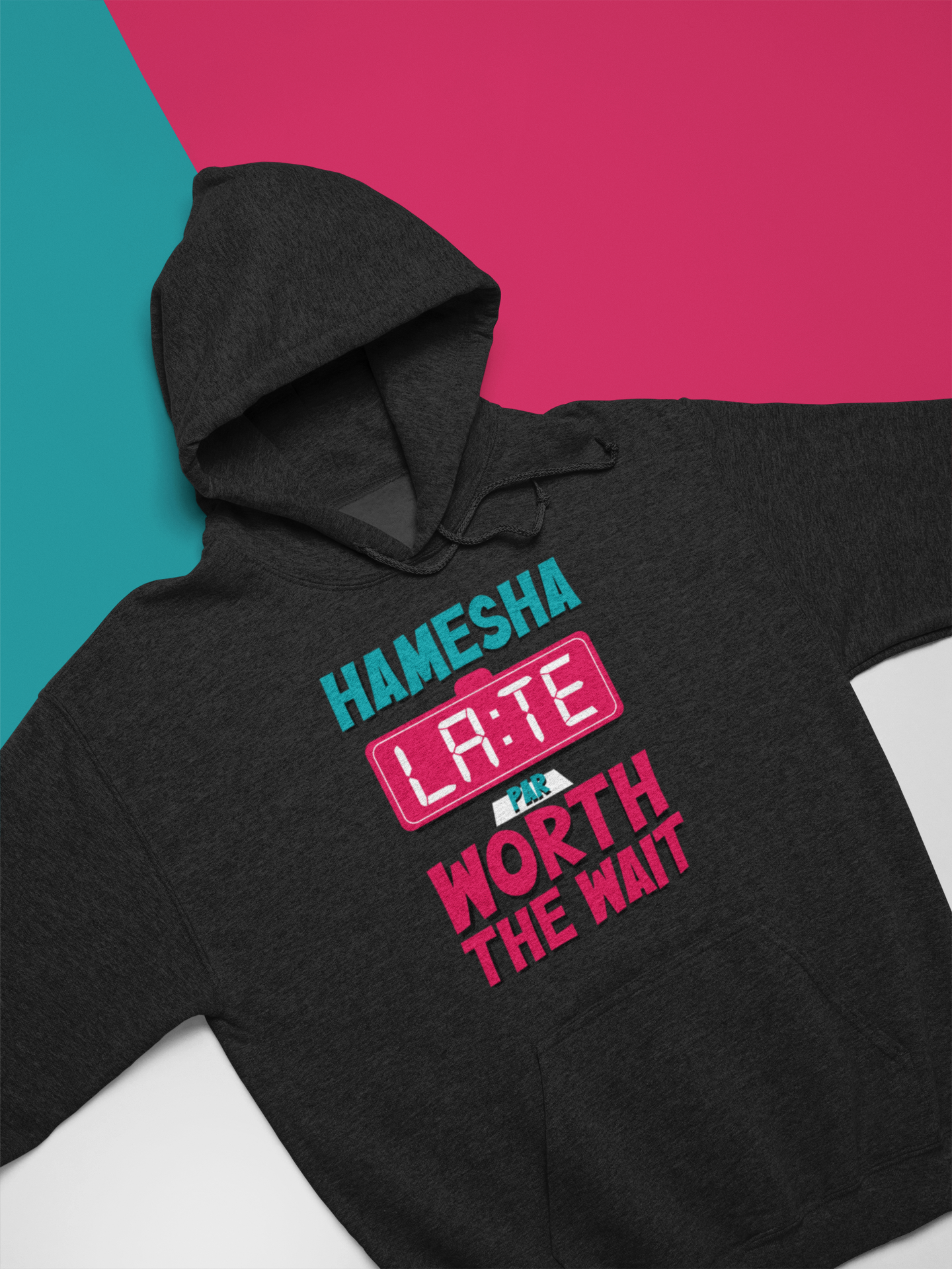 Hamesha Late Champion hoodie in black with colorful text "Hamesha Late Worth the Wait" on a stylish background.