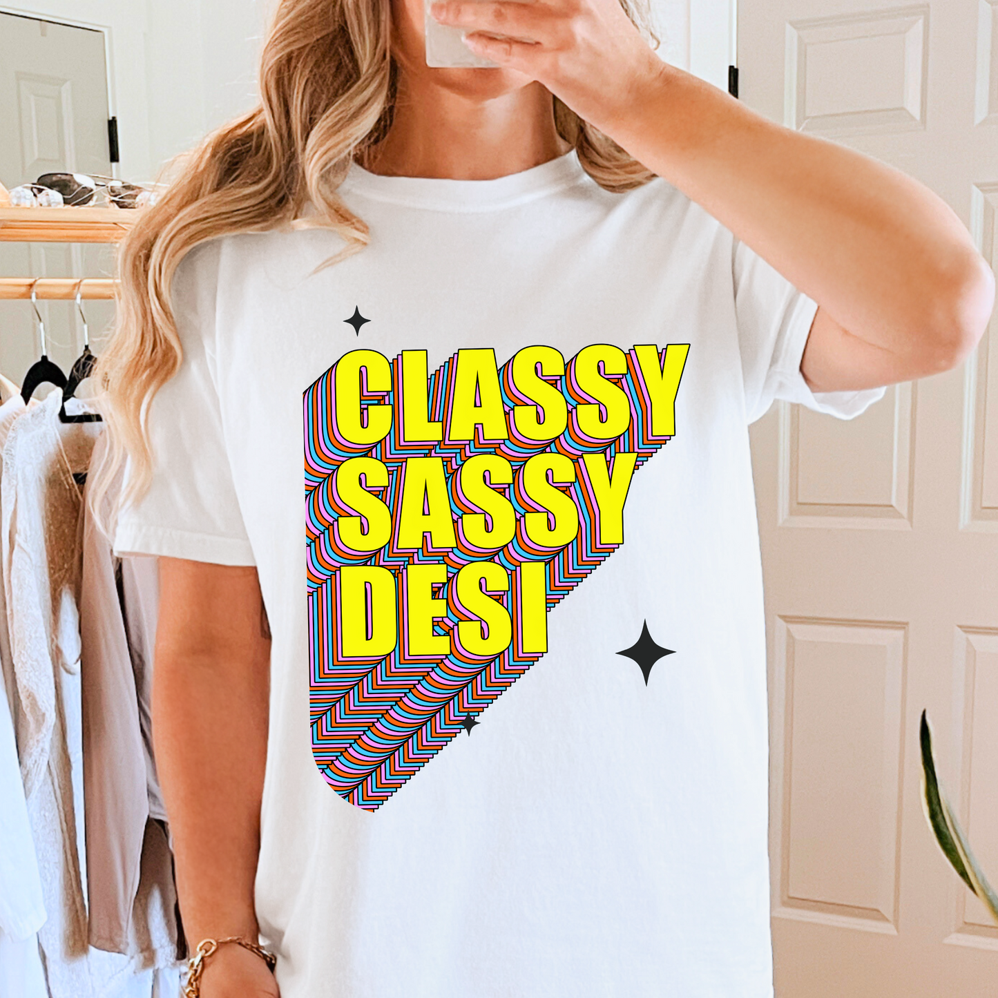 Female model wearing classy sassy desi graphic tshirt in white colour.